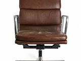an image of a brown leather office chair on wheels