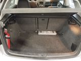 a trunk of a car with the back seats folded down