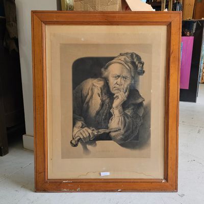 an old picture of an old man holding a knife in his hand