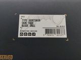an image of a label on the back of a laptop