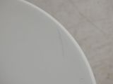 a close up of a white toilet bowl with the lid down