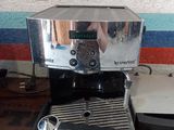 a coffee maker that is sitting on a table