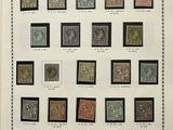 an open book with a bunch of different stamps on it