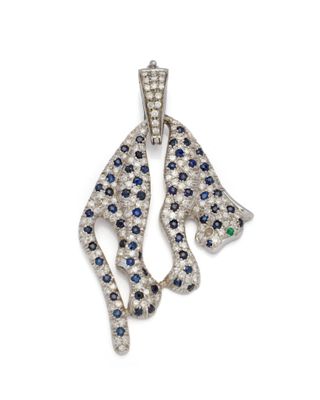 un pendentif en forme de panthère, serti de diamants et de saphirs