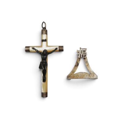 cross with a man on the cross and a person on the cross