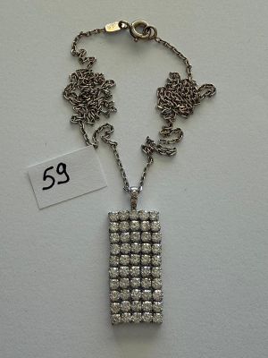 Chaîne en or gris, maille Forçat soutenant un Pendentif Arti…