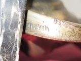 a close up of a piece of metal with writing on it