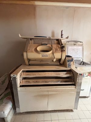 an image of a kitchen with a washing machine and a washer