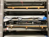 a large rack with a lot of metal items on it