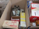 a box full of assorted items sitting on the floor