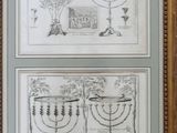 two framed drawings of menorah candles and chandeliers on a wall