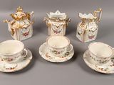 five pieces of porcelain tea and coffee set on the table