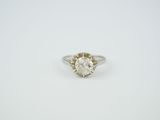 an engagement ring with a single diamond in the center