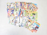 a pile of children ' s books on a white surface