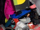 a bag full of clothing and a book in it
