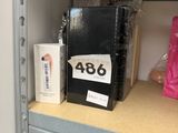 a shelf that has a lot of items on it