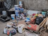 a pile of construction materials on the floor of a building