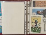 a binder with pictures of people and animals on it