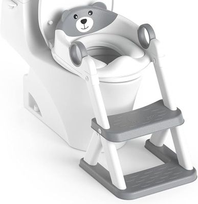 an image of a baby potty with a teddy bear on it