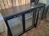 an image of a metal counter top with two glass doors