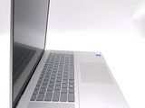 a close up of a laptop computer on a white surface