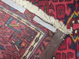 a close up of a rug with a piece of tape on it