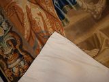 a close up of a piece of cloth with a picture on it