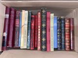 a box full of books that are sitting on a table