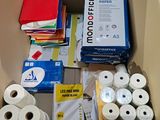many rolls of toilet paper in a cardboard box