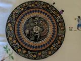 a picture of a decorative plate on a table