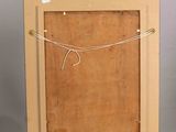 an easel with a piece of wood on top of it