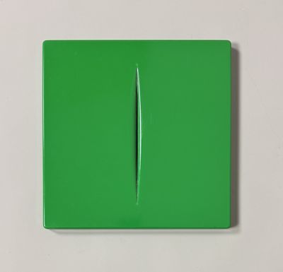 an image of a green light switch on a white wall
