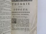 an open book with a black and white image of the title of the song