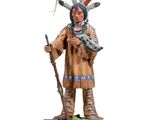 statue of a native american man with a rifle and a rifle