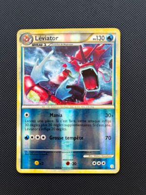 a close up of a pokemon card on a table