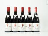 six bouteilles de vin rouge alignées