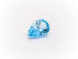 a blue topazte gems on a white background