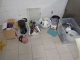 a photo of a bathroom with a lot of clutter on the floor