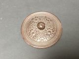 a small metal object that is on a table