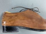 an image of a pair of shoes that are on a table