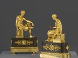 paire de figurines en bronze doré représentant une femme et un homme