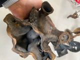 a person holding a piece of metal in their hand