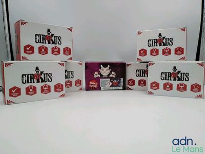 three boxes of circus cards are stacked on top of each other