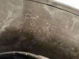 a close up view of a black hat with writing on it