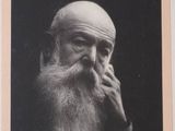 an old black and white photo of a man with a long beard