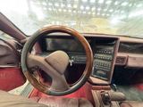 dashboard of a car with a steering wheel and dashboard controls