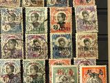 an image of a collection of stamps with a picture of a man and a woman