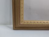 an image of a picture frame on a wall with a white background