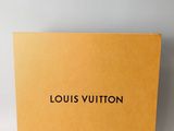 a louis vuitton box on a white background