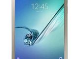 a close up of a tablet with a water splash on the screen